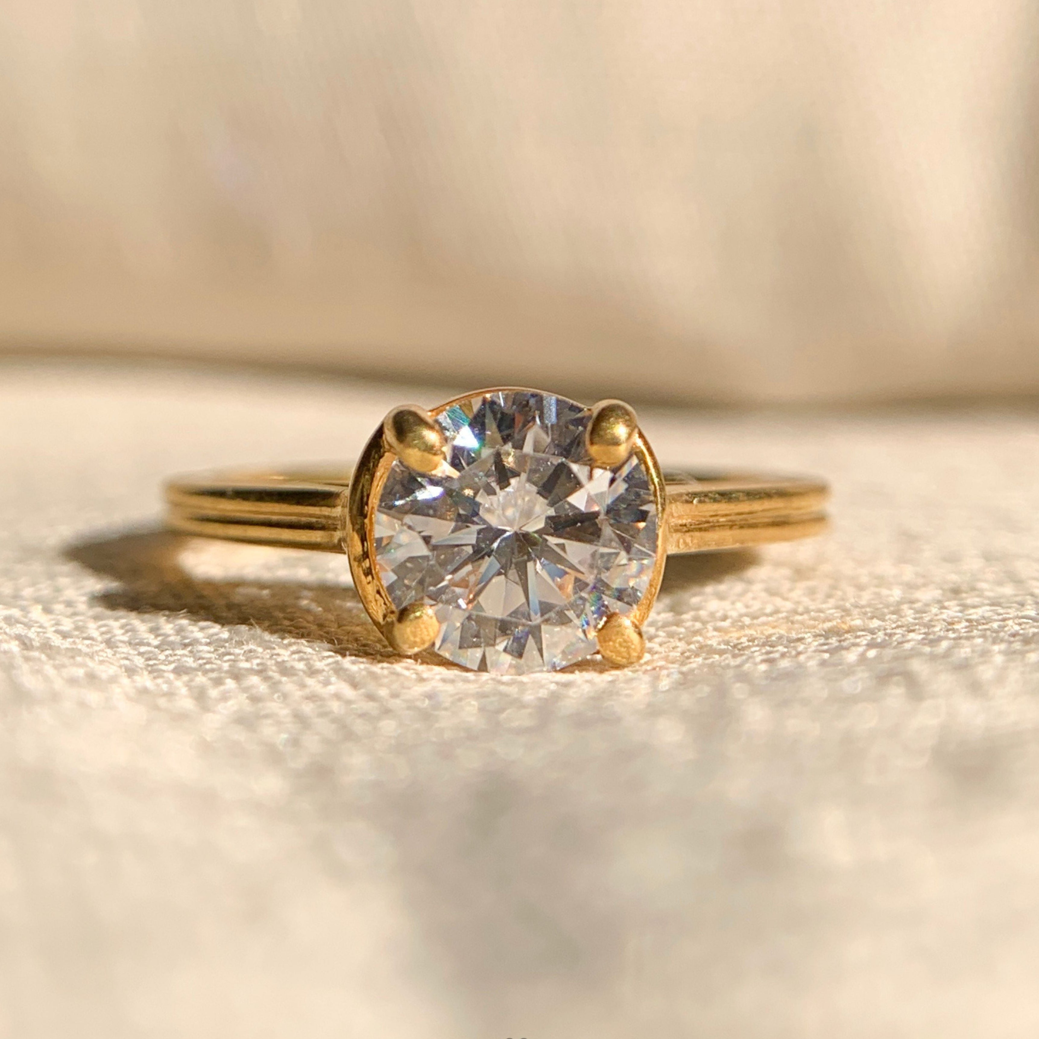 Moissanite round diamond solitaire engagement ring in white gold